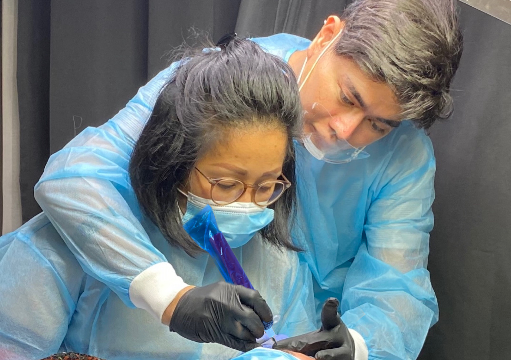 Edson Gonzales guiding a student during hands-on Nanobrows training
